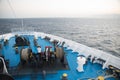 Aegean Sea, Greece/ July 17, 2018: Seaman working on foredeck of Royalty Free Stock Photo