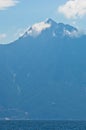 Aegean sea, silhouette of the holy mountains Athos and a small cloud above the mountain top Royalty Free Stock Photo