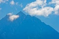Aegean sea, silhouette of the holy mountains Athos and a small cloud above the mountain top Royalty Free Stock Photo