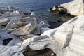 Aegean seashore and marble rocks in Aliki Royalty Free Stock Photo