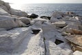 Aegean seashore and marble rocks in Aliki Royalty Free Stock Photo