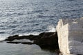 Aegean seashore and marble rocks in Aliki Royalty Free Stock Photo