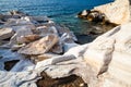 Aegean seashore and marble rocks in Aliki, Thassos island Royalty Free Stock Photo
