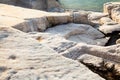 Aegean seashore and marble rocks in Aliki, Thassos island Royalty Free Stock Photo