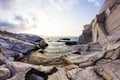 Aegean seashore and marble rocks in Aliki, Thassos island, Greece Royalty Free Stock Photo