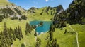 Aeiral view of the turquoise Lake Hinterstocken at the foot of Stockhorn peak