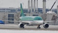 Aer Lingus doing taxi on snowy airport