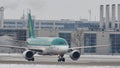 Aer Lingus doing taxi on snowy airport
