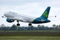 Aer Lingus plane landing on runway, new livery