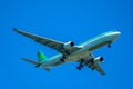 Aer Lingus plane descending for landing at JFK International Airport in New York