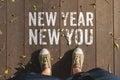 Aerail view of New year new you word on wooden plank floor with Royalty Free Stock Photo