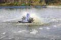 Aerator and turbine water in fish pool Royalty Free Stock Photo