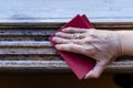 Hands of a woman with a sandpaper sanding a window frame before painting. Empowered woman concept. Aereal view Royalty Free Stock Photo