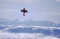 A pilot in a small Pitts bi-plane performs aerial acrobatics Royalty Free Stock Photo