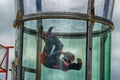 Aerial acrobatics in a wind tunnel