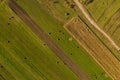 Aerial agricultural pattern view from a drone. Green meadow
