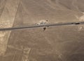 Aerial airplane panoramic view to Nazca geoglyph lines aka lizard, hands and tree, Ica, Peru Royalty Free Stock Photo