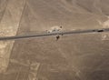 Aerial airplane panoramic view to Nazca geoglyph lines aka lizard, hands and tree, Ica, Peru