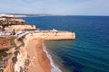 Aerial from the Algarve coastline at Church Senhora de Nossa in Armacao de Pera Portugal