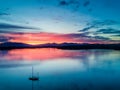 Aerial of an amazing sunset with sailing vessel Loch Creran, Barcaldine, Argyll Royalty Free Stock Photo