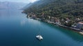 AERIAL. Amazing view to Catamaran cruising in open sea at windy day. Drone view - birds eye angle Royalty Free Stock Photo