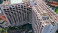 aerial apartment residence with heliport on the roof. Aerial view on rooftop and street