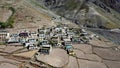 Aerial approaching shot of a Small Secluded Himalayan Village in Mudh Village , Spiti , Himachal