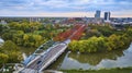 Aerial Autumn Cityscape with Modern Bridge and River at Sunrise Royalty Free Stock Photo