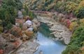 Aerial autumn color view of Asashiyama mountain and Hozugawa river in Kyoto, Japan