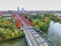 Aerial Autumn Urban Park with Modern Bridge and Water Reflection, Fort Wayne