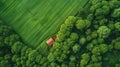 Aerial banner of lush green agricultural fields in a typical european countryside village town