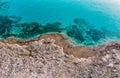 Aerial beach and coastline at sunset over rock and sea. Italy amazing coast