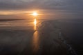 Aerial from a beautiful sunset at thje Wadden Sea in Friesland the Netherlands