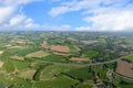 Aerial beautiful view of german countryside landscape and blue sky with clouds. Natural color pattern of farm fields and highway