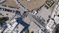 Aerial bird eye shot of windmills in Mykonos island, Greece on a sunny day.