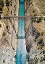 Aerial bird`s eye view photo taken by drone of famous Corinth Canal with turquoise water, Peloponnese, Greece. The Royalty Free Stock Photo