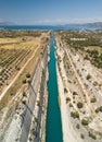 Aerial bird`s eye view photo taken by drone of famous Corinth Canal with turquoise water, Peloponnese, Greece. The Royalty Free Stock Photo