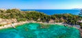 Aerial birds eye view drone photo Anthony Quinn and Ladiko bay on Rhodes island, Dodecanese, Greece. Panorama with nice lagoon and Royalty Free Stock Photo