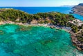 Aerial birds eye view drone photo Anthony Quinn and Ladiko bay on Rhodes island, Dodecanese, Greece. Panorama with nice lagoon and Royalty Free Stock Photo