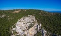 Aerial birds eye view drone photo ruins of Monolithos castle on Rhodes island, Dodecanese, Greece. Panorama with high mountain