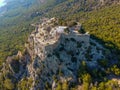 Aerial birds eye view drone photo ruins of Monolithos castle on Rhodes island, Dodecanese, Greece. Panorama with high mountain Royalty Free Stock Photo