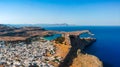 Aerial birds eye view drone photo of village Lindos, Rhodes island, Dodecanese, Greece. Sunset panorama with castle, Mediterranean Royalty Free Stock Photo