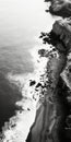 Aerial Black And White Photography Of Coastal Cliffs And Waves