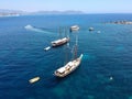 Aerial boat, sailing in Greece and summer sun on ocean holiday, relax in freedom and nature. Yacht vacation, travel and Royalty Free Stock Photo