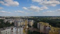 Aerial Building Process of Construction Site. Engineers crane and city