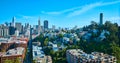 Aerial buildings and road leading to heart of downtown San Francisco and Coit Tower on hill Royalty Free Stock Photo