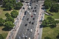 Aerial of busy street and sidewalk traffic with cars and people Royalty Free Stock Photo