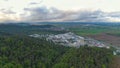 AERIAL Cinematic shot of the long-sprawling suburbs of Ljubljana on a cloudy day