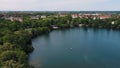 Aerial city scape of Weissensee lake during summer in Prenzlauerberg Berlin Germany