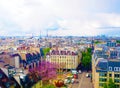 Aerial city view of beautiful buildings on horizon in spring in Paris,View on Eiffel Tower,Business Center La Defense,Paris,France Royalty Free Stock Photo